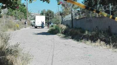 Ejecutan a mujer en un tramo de terracería en Tijuana