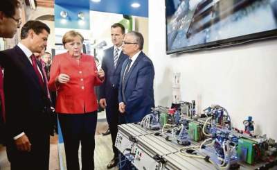 Angela Merkel y Peña Nieto defienden el libre comercio