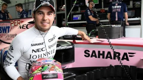 Pilotos de F1 firman casco de Checo para apoyar a damnificados en México