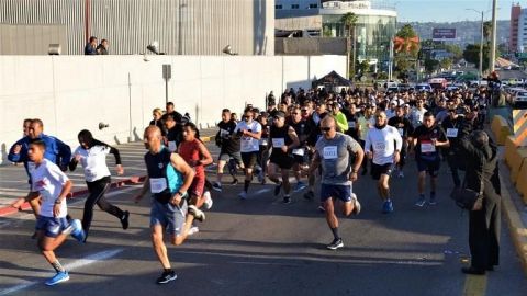 Ganan Miguel Pérez y Sara Lizardi carrera  del Día Internacional del Policía