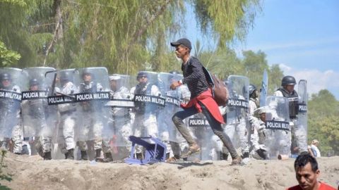CNDH inicia investigación de enfrentamiento entre migrantes y GN
