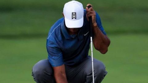 Tiger Woods se resiente de la espalda