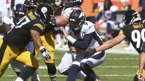 Lock sale lesionado y Steelers frenan remontada de Broncos