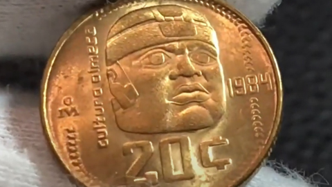 Moneda de 20 centavos con cabeza Olmeca se vende en 6 mil 500 pesos
