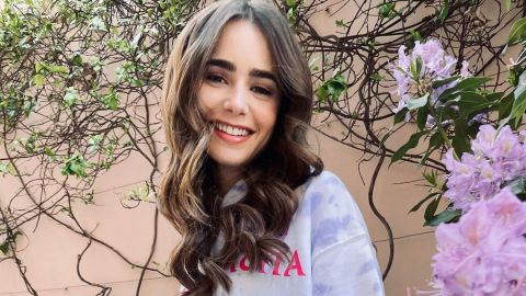 Lily Collins se luce con bikini azul durante grabación en Francia