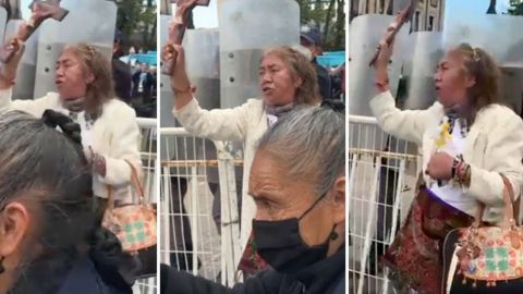 Con crucifijo y agua bendita, mujer protesta en contra del aborto