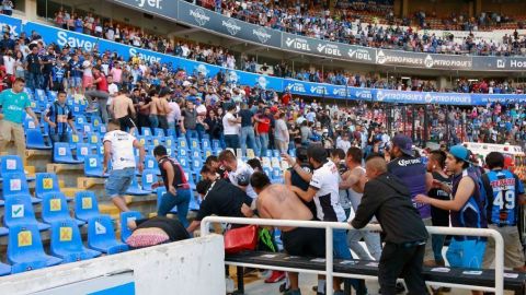 Detienen a dos más por trifulca en estadio de Querétaro
