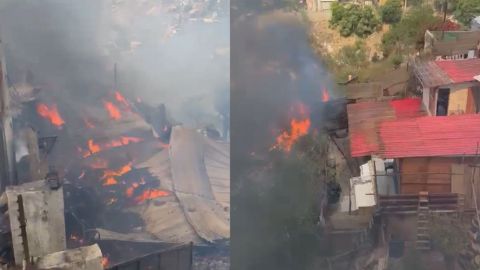 Incendio de vivienda en asentamiento irregular se propaga a zona de vegetación